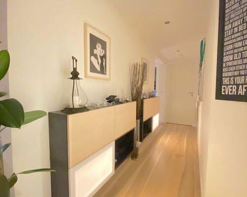 Charmerende 5-værelses taglejlighed med synlige bjælker og stor altan