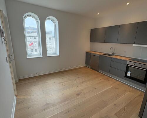 Charmerende 3. værelses lejlighed