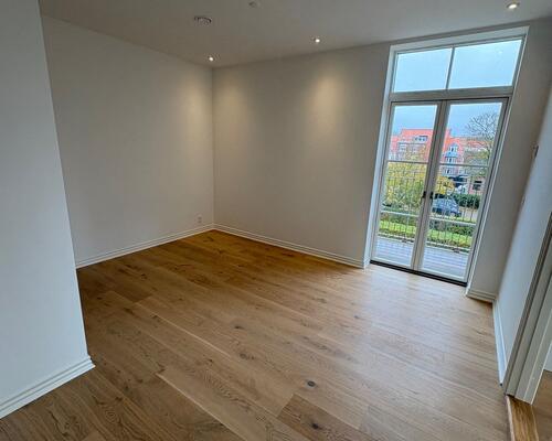 Charmerende 3. værelses lejlighed