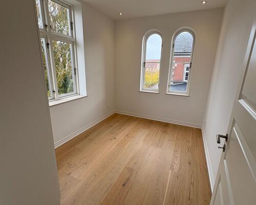 Charmerende 3. værelses lejlighed