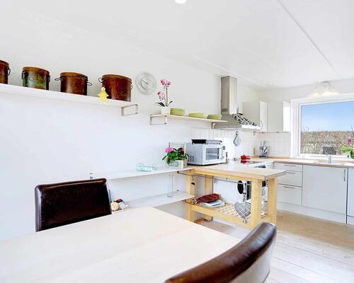 Flot rækkehus med solrig have | Tølløse