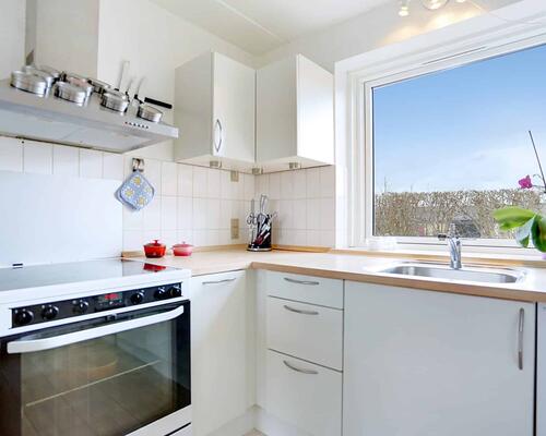 Flot rækkehus med solrig have | Tølløse