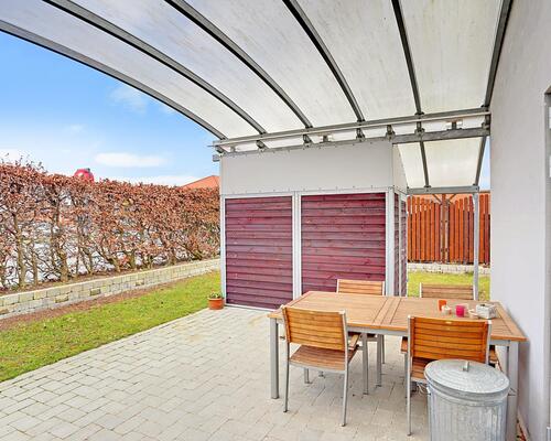 Flot rækkehus med solrig have | Tølløse