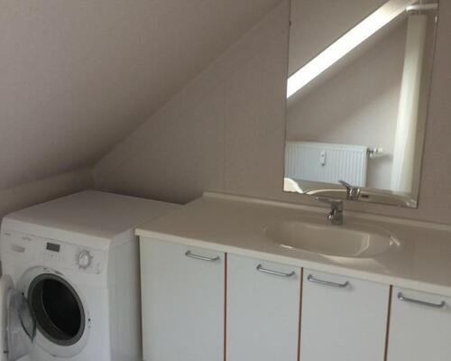 Centrale beliggende lejlighed med egen altan...