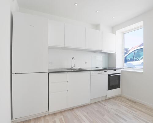 Flot og moderne bolig med dejligt udeområde og lukket gårdmiljø i hjertet af Nørresundby