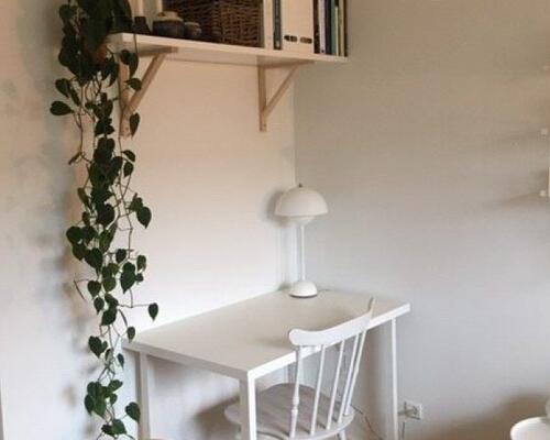 Delevenlig 2-værelses lejlighed med egen altan