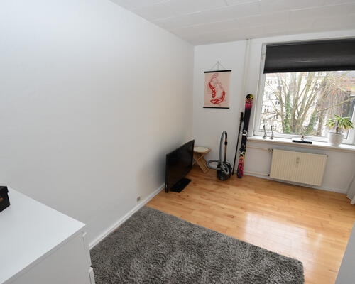 Lys og indbydende lejlighed i Aalborgs hjerte