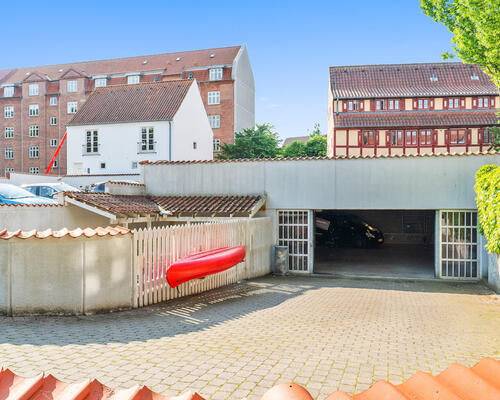 Unik lejlighed i 2 plan med kig til Odense å – 87 Kvm