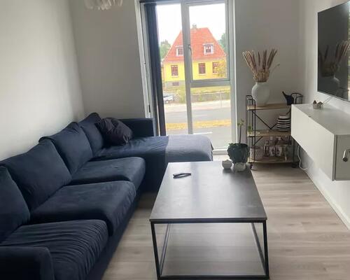 Skøn delevenlig lejlighed med altan