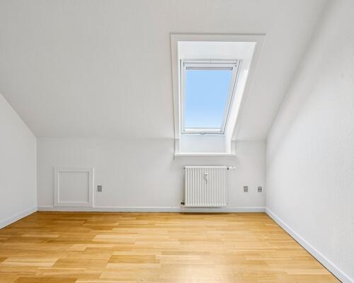 Lys og centralt beliggende 3-værelses lejlighed i Haslev