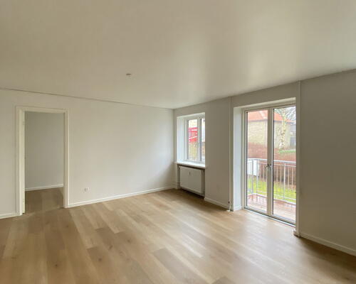 Rummelig 3-værelses lejlighed med lækker altan