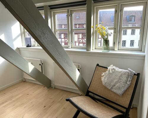 Unik lejlighed i 2 plan med kig til Odense å – 87 Kvm