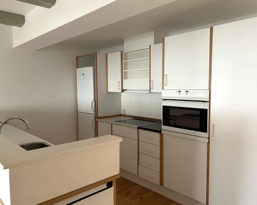 Unik lejlighed i 2 plan med kig til Odense å – 87 Kvm