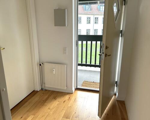 Unik lejlighed i 2 plan med kig til Odense å – 87 Kvm