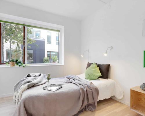 Eksklusivt rækkehus med tagterrasse og privat parkering | København S.