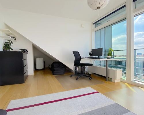 Skøn lys penthouse i to plan