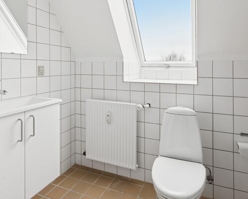 Nyistandsat lejlighed øverst i ejendommen.