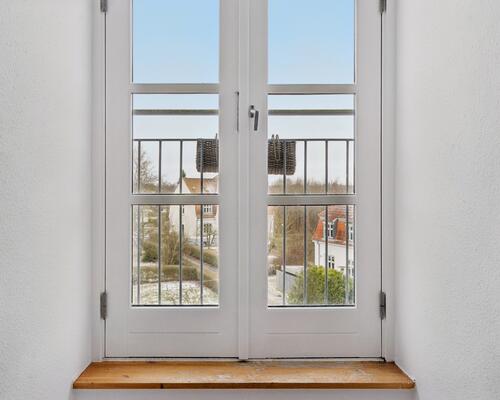 Nyistandsat lejlighed øverst i ejendommen.