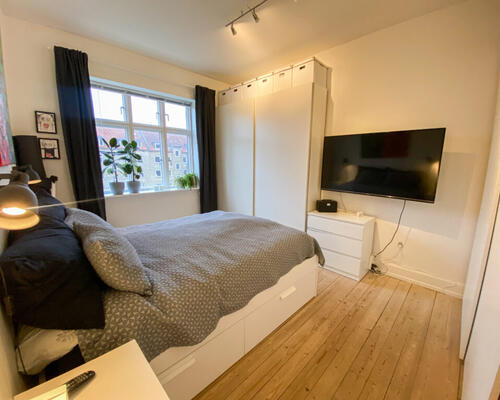 Hyggelig 2 værelses lejlighed med udsigt til østre anlæg