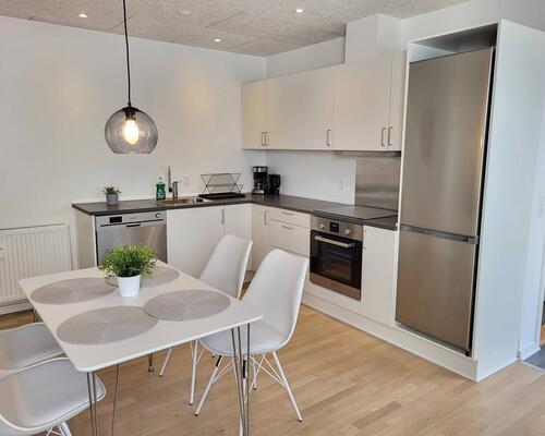 Flot fritliggende 4. værelses rækkehus i Vejle.