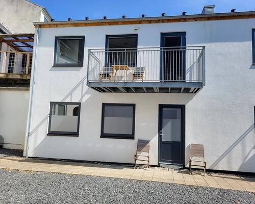 Flot fritliggende 4. værelses rækkehus i Vejle.