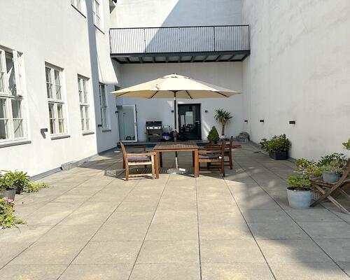 Unik lejlighed med stor privat terrasse, i hjertet af København