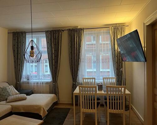 Stor 3. værelses stuelejlighed