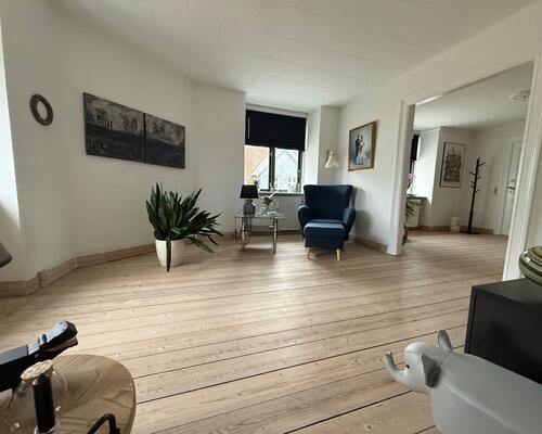 137 m² i to plan med super flot udsigt over by og vand.