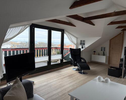 137 m² i to plan med super flot udsigt over by og vand.