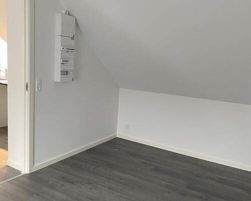 Renoveret lejlighed med stor altan.