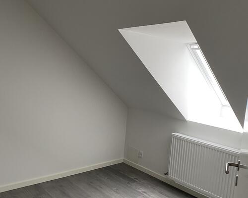 Renoveret lejlighed med stor altan.