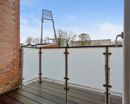 Lys og velindrettet 3-værelses lejlighed med altan