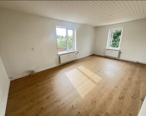 Stor lejlighed med egen tagterrasse i Ulbjerg