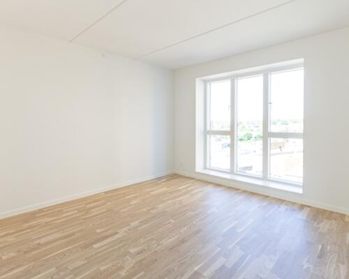 Rummelig 3-værelses lejlighed med altan