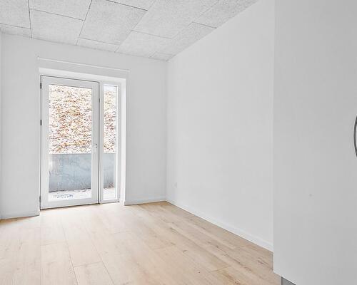 Lækker, nyrenoveret lejlighed med terrasse