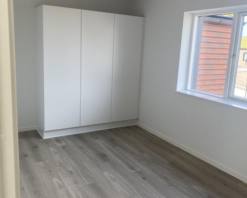 Eksklusivt rækkehus med privat terrasse.