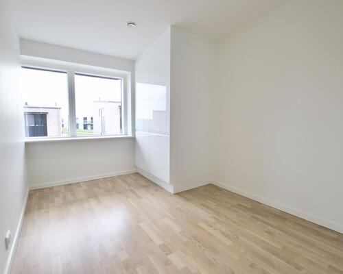 Fritliggende 4-værelses rækkehus på Marshalls Alle