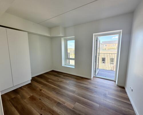 Delevenlig lejlighed med stor altan og parkudsigt