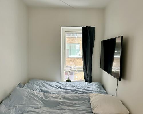 Skøn 4-værelses lejlighed med altan og udsigt