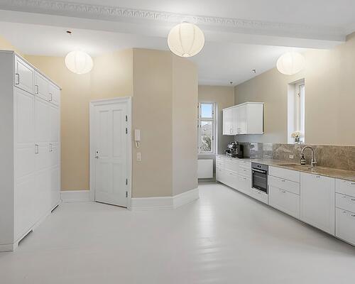 Eksklusiv villalejlighed i en smuk renoveret ejendom