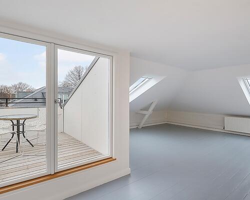 Eksklusiv villalejlighed i en smuk renoveret ejendom