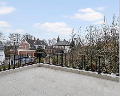 Eksklusiv villalejlighed i en smuk renoveret ejendom