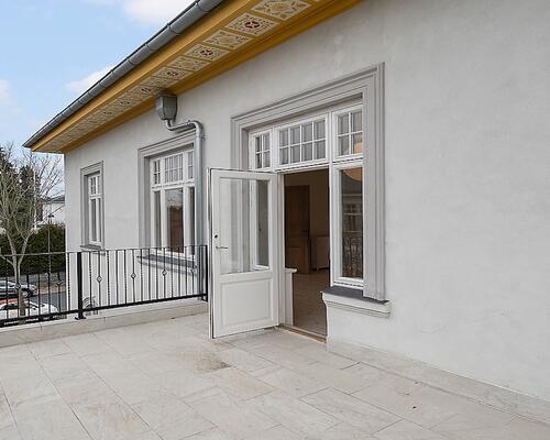 Eksklusiv villalejlighed i en smuk renoveret ejendom