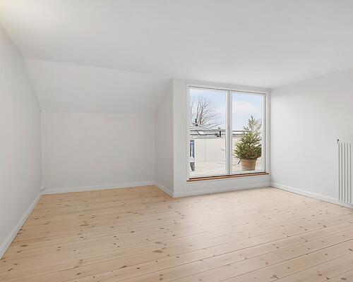 Eksklusiv villalejlighed i en smuk renoveret ejendom