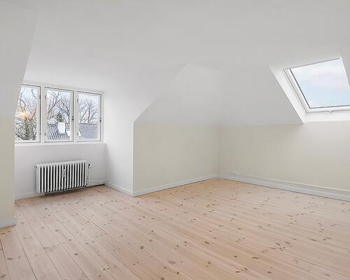 Eksklusiv villalejlighed i en smuk renoveret ejendom