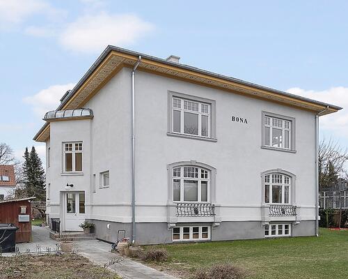 Eksklusiv villalejlighed i en smuk renoveret ejendom