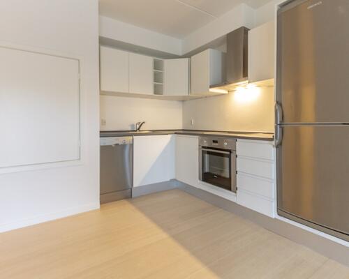 Stuelejlighed med stor privat terrasse