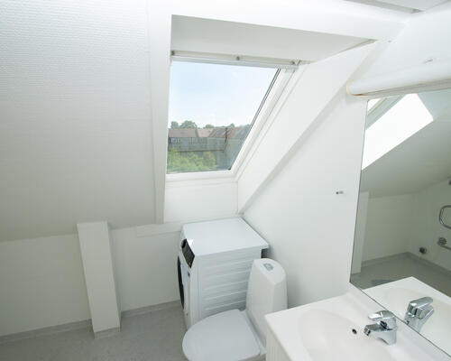 Charmerende taglejlighed med loftbjælker i Aalborg