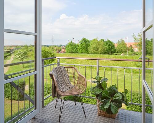 Skøn 3-værelses lejlighed med altan