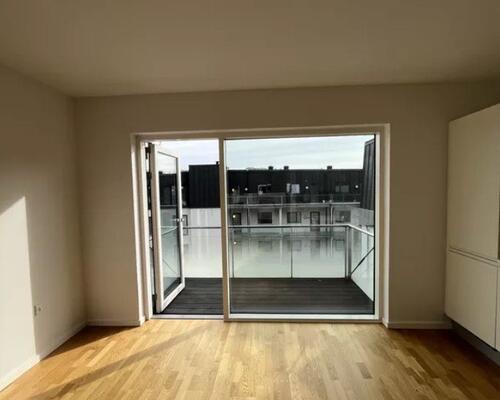 Lys 4-værelses med altan i hjertet af Borggade